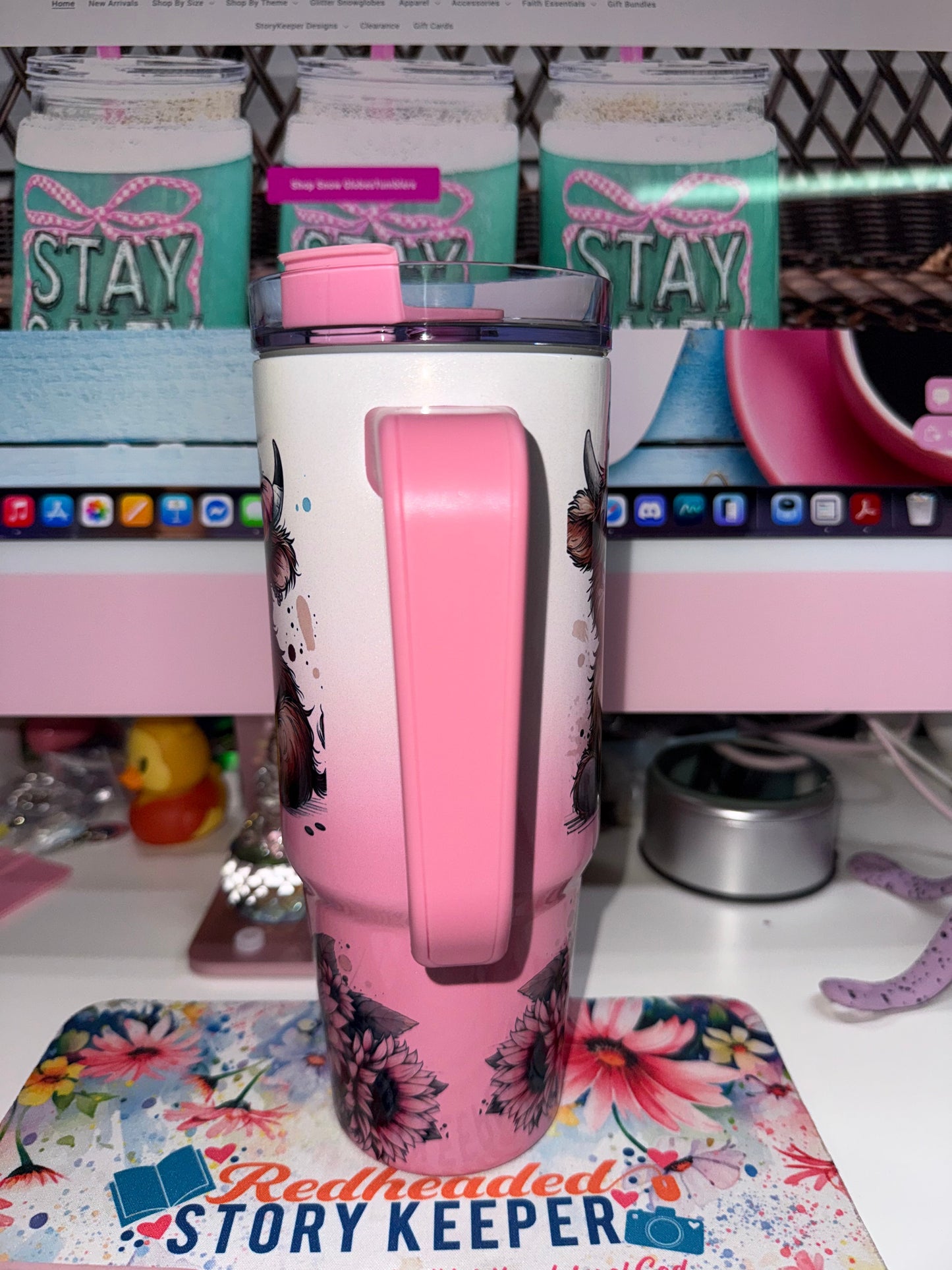 30 oz Coffee Mode Grippy Tumbler Limited Edition - handle side view showing pink carry handle with highland cow design visible