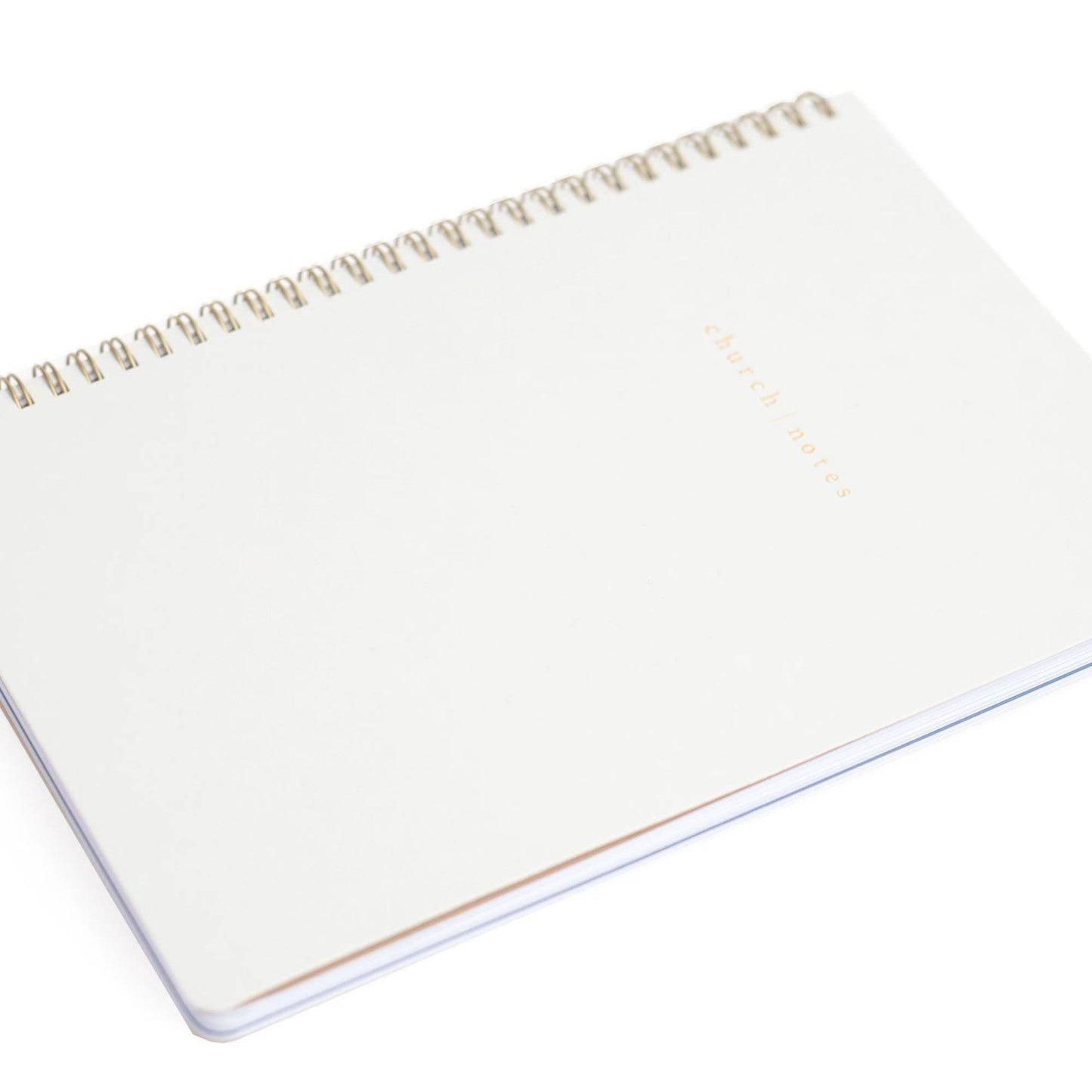 White spiral-bound notebook on a white background