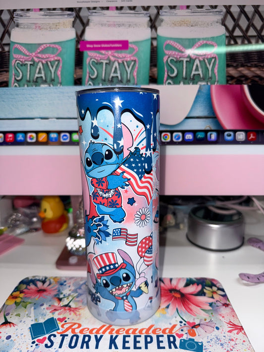 20 oz America Stitch Tumbler - side view showing Stitch in red Hawaiian shirt waving American flag with fireworks and stars