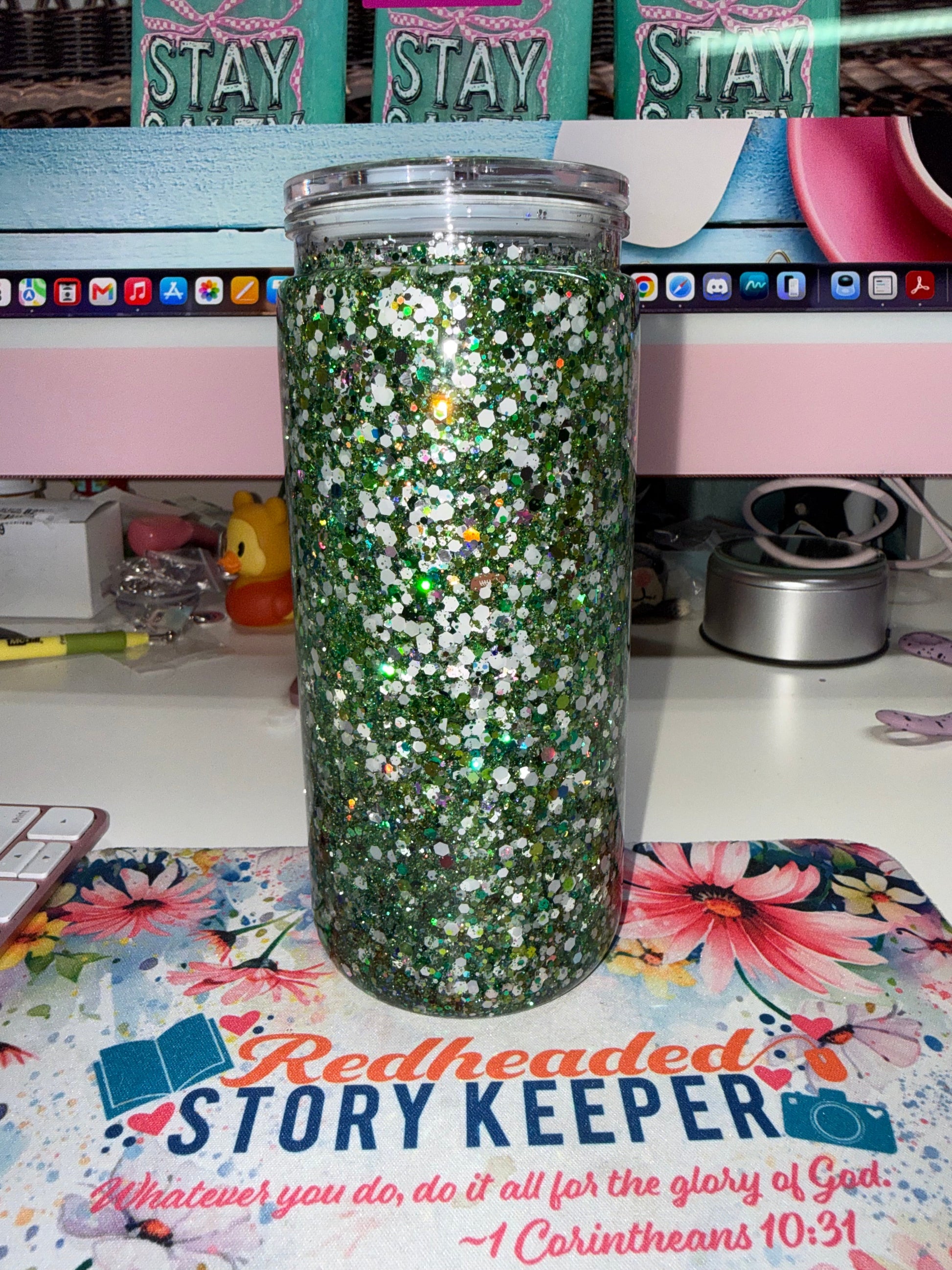 20 oz Eagles Glitter Tumbler - back view showing chunky green and holographic glitter catching light on clear double-wall acrylic tumbler