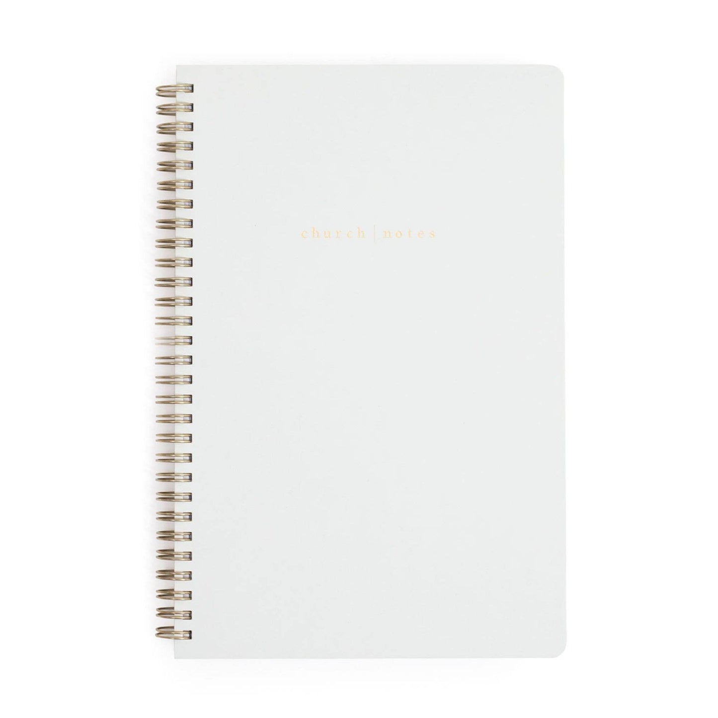 White notebook with spiral binding on a white background
