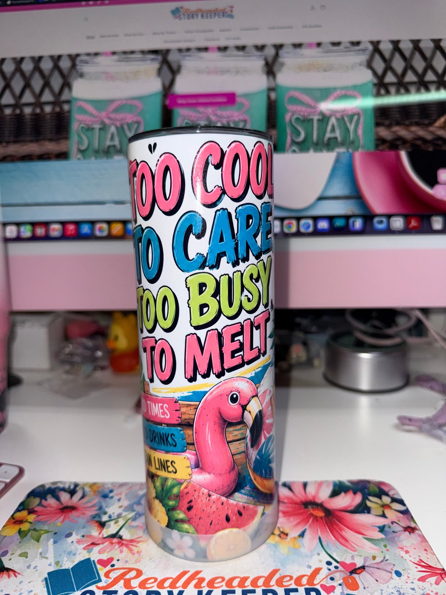 20 oz Too Cool To Care Tumbler - back view showing Too Cool To Care Too Busy To Melt text with pink flamingo pool float watermelon pineapple and tropical fruit accents