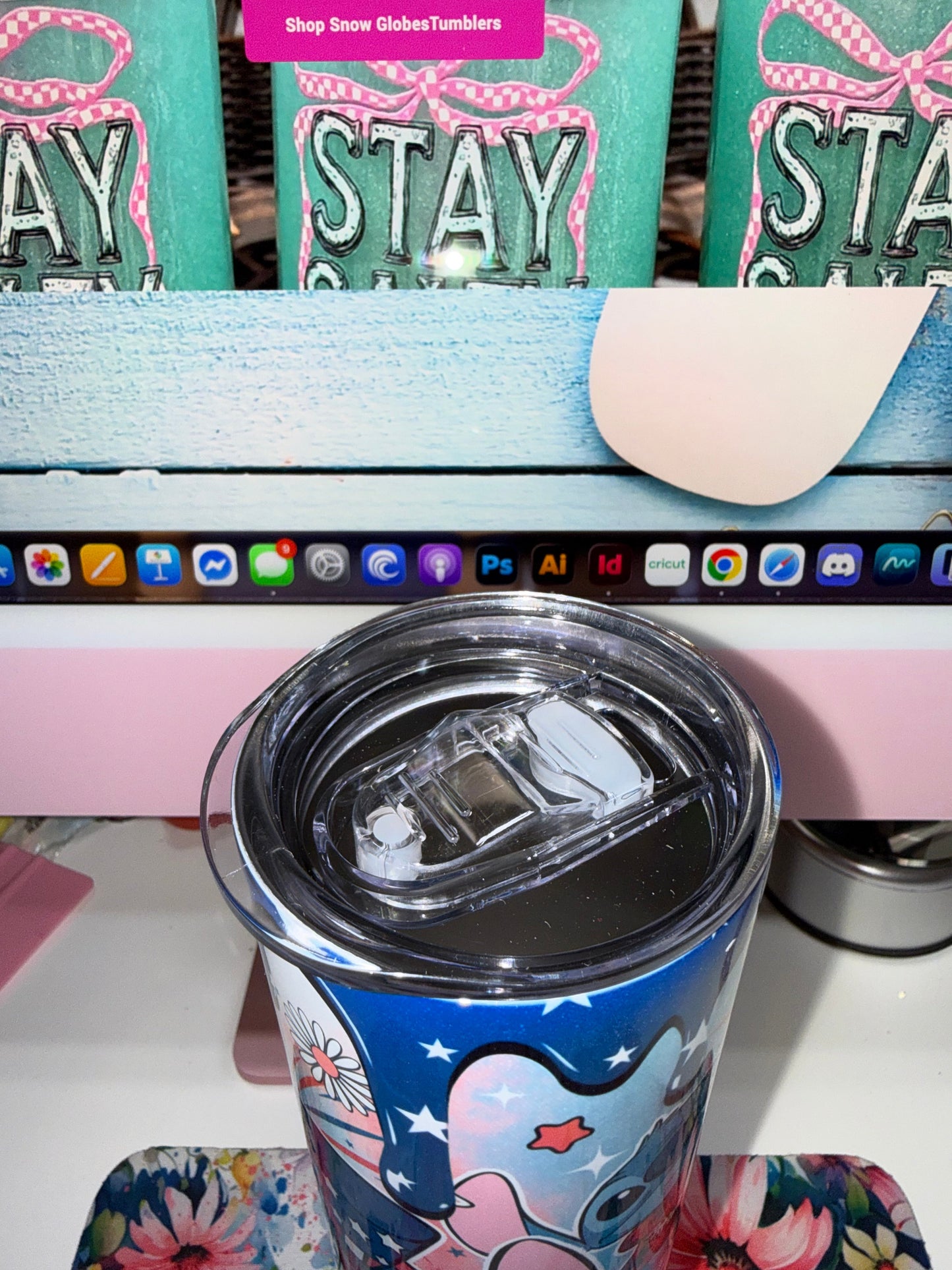 20 oz America Stitch Tumbler - top-down view showing clear flip-up locking lid with straw opening
