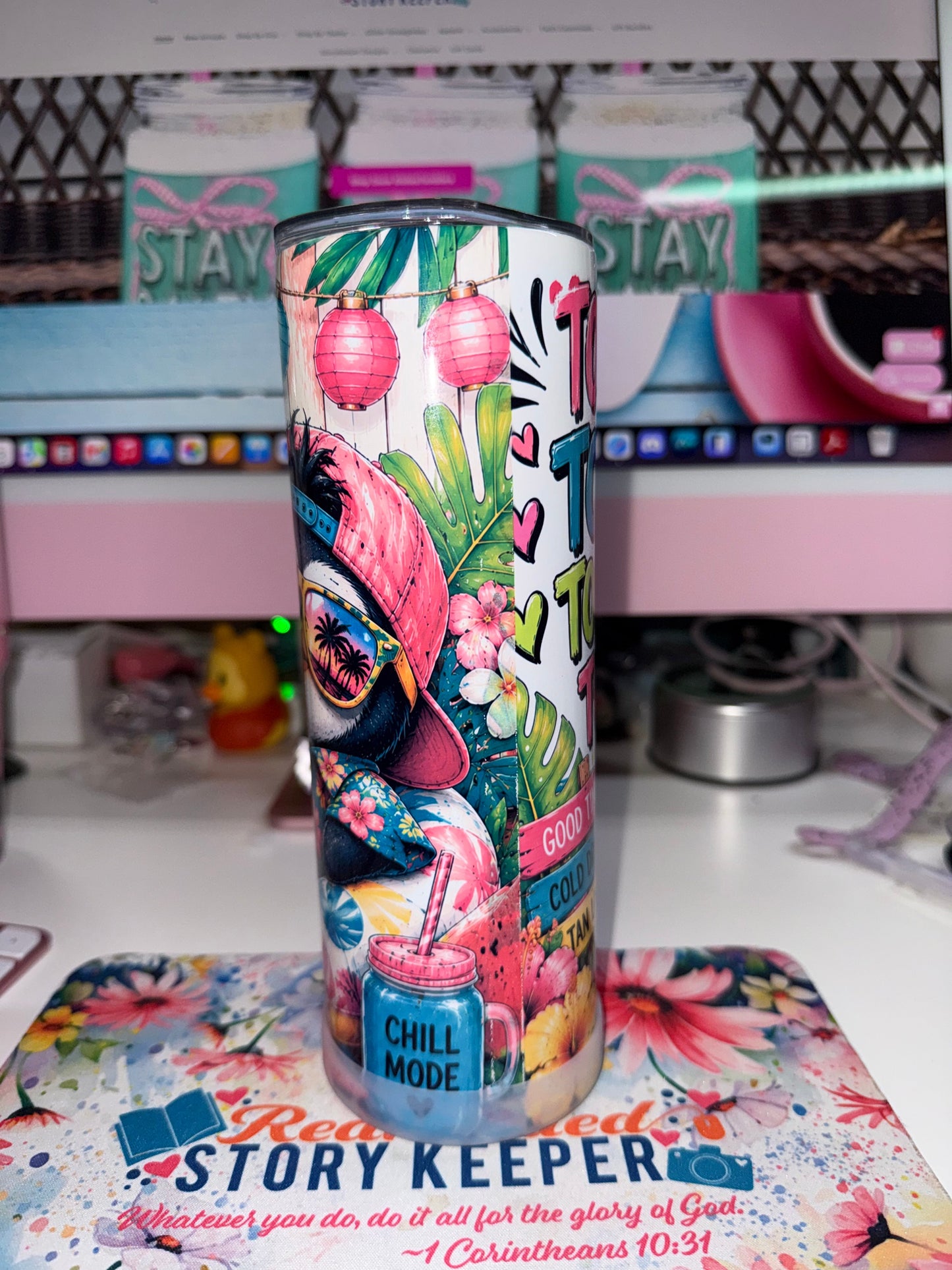 20 oz Too Cool To Care Tumbler - side view showing penguin in pink cap with pink lanterns tropical leaves and Chill Mode mason jar drink blending into text side