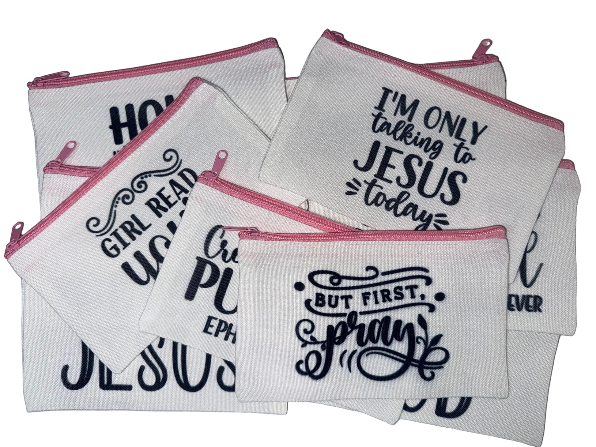 Set of white pouches with black text and pink zippers on a light gray background