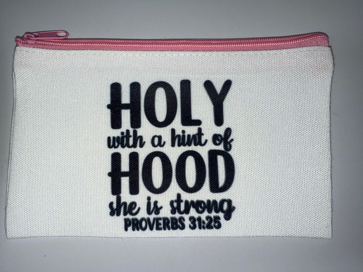 White pouch with black text on a gray background