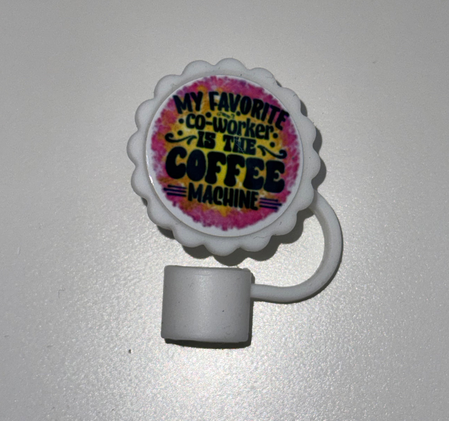 straw topper with colorful text on a white background