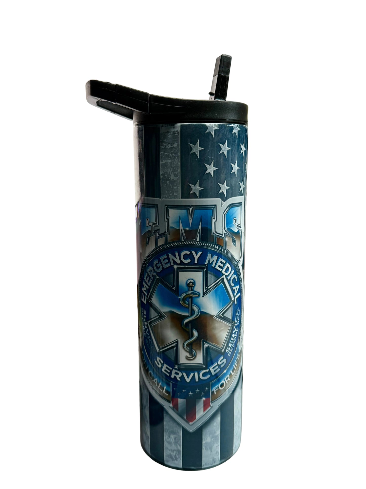 Tumbler with EMS design on a desk in front of a computer screen