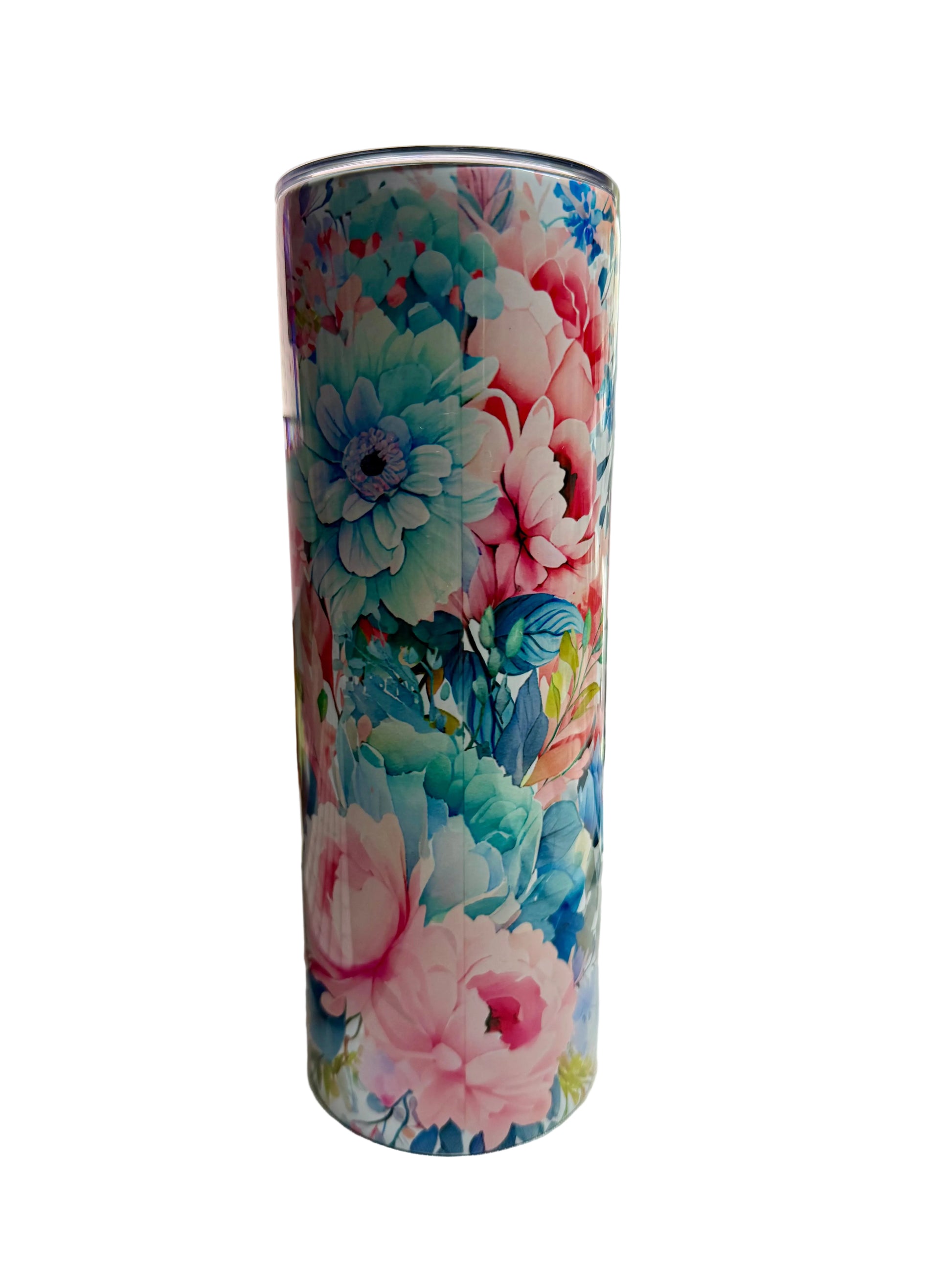 Floral-patterned tumbler on a desk with office items in the background