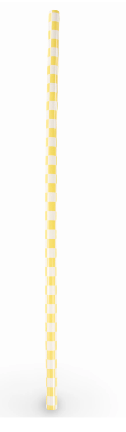 Yellow and white striped straw on a white background